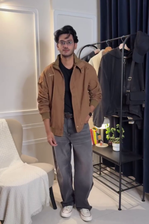 stand collar bomber jacket in a durable twill denim fabric.