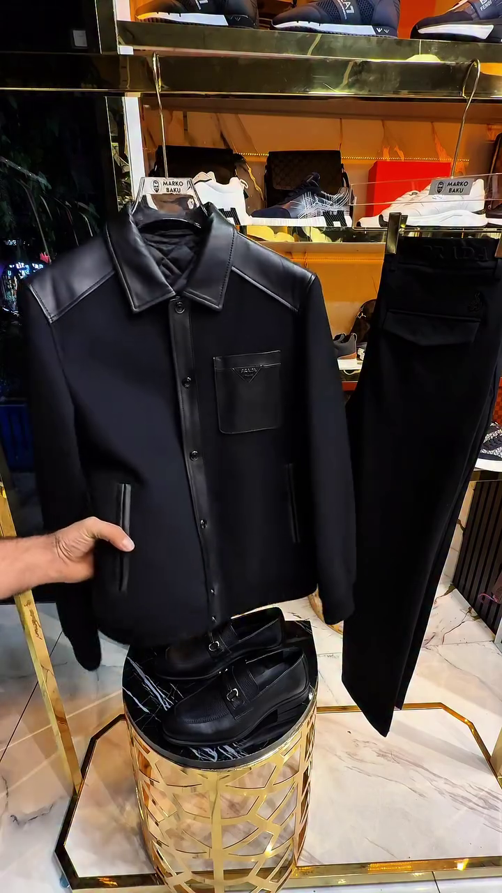 The Peak of Florentine Luxury: Ferragamo Black Pointed-Collar Wool & Leather Jacket